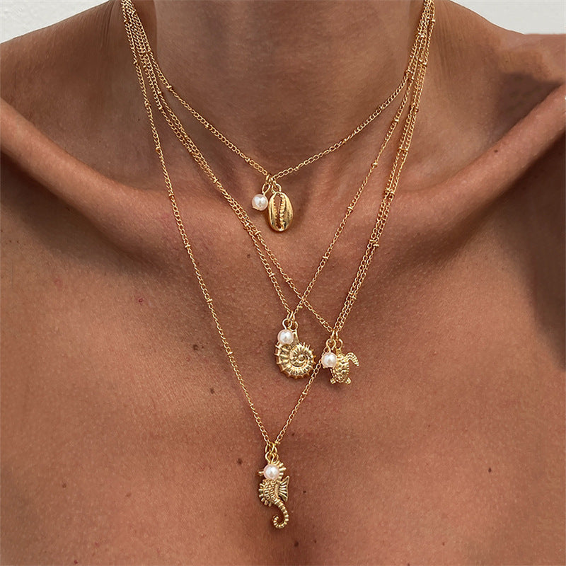 Starfish, shell, conch pendant, pearl, a versatile summer accessory for women with multiple layers